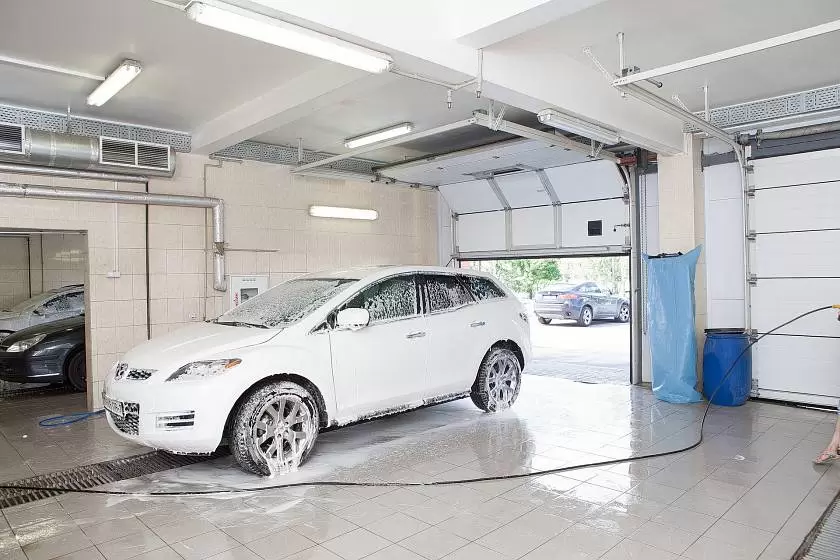 Купон на комплексную мойку автомобиля в подарок при покупке секционных ворот Prestige